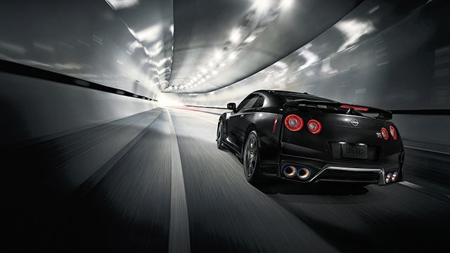 2023 Nissan GT-R seen from behind driving through a tunnel | Passport Nissan in Marlow Heights MD